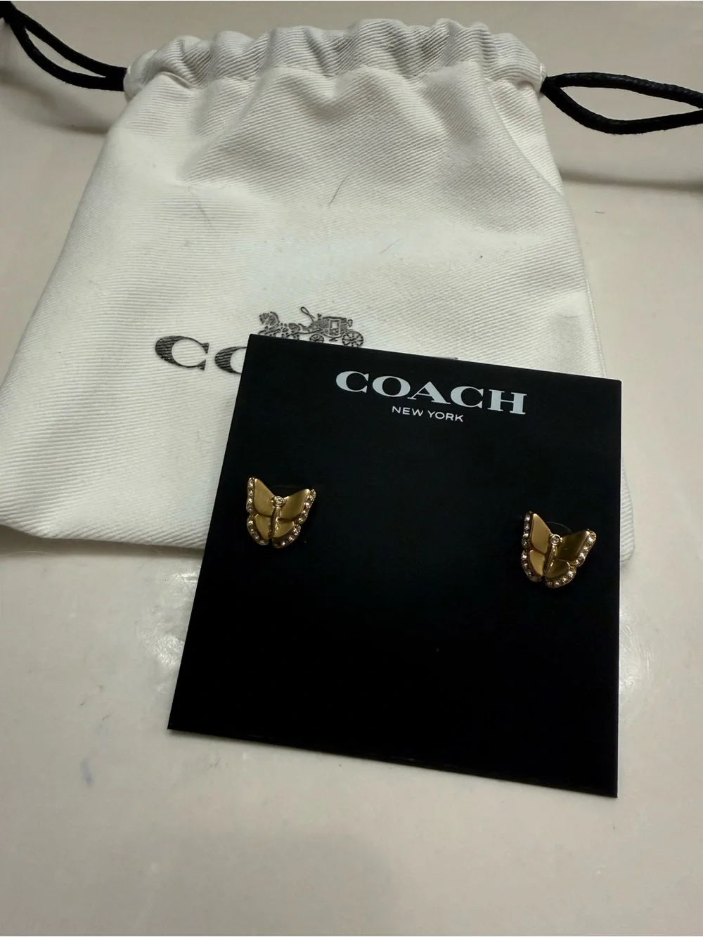 Coach Gold Butterfly Stud Earrings with White Drawstring Pouch - Picture 2 of 2